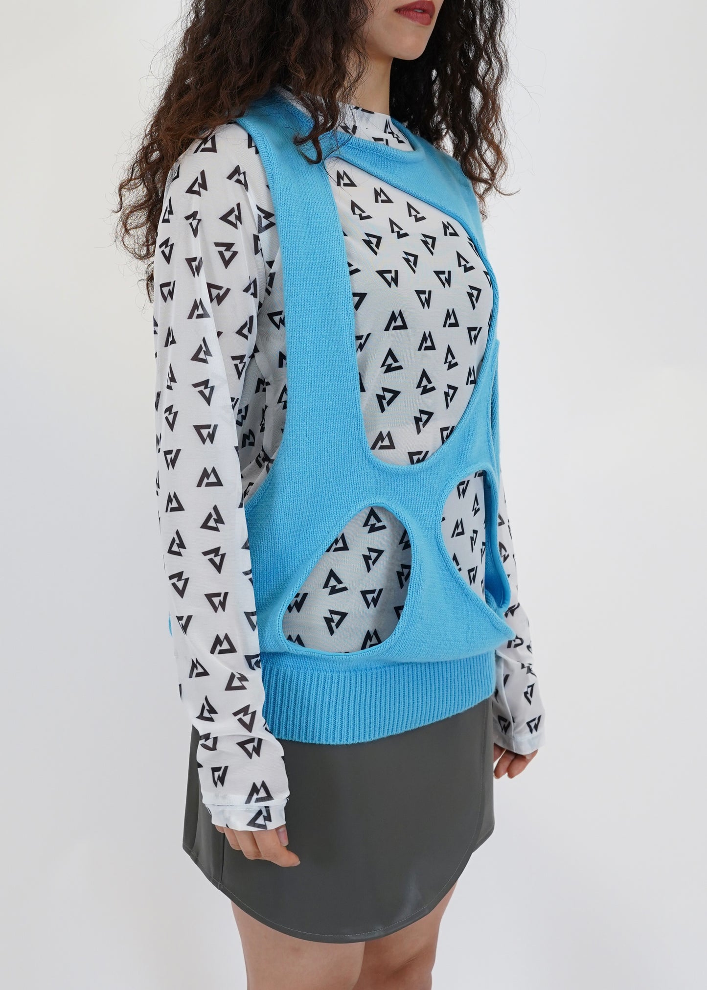 Asymmetrical knitwear vest